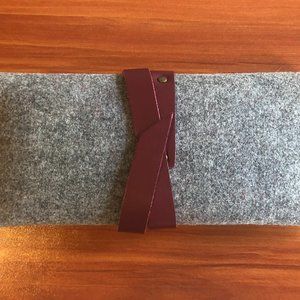 Grey felt clutch with leather wrap